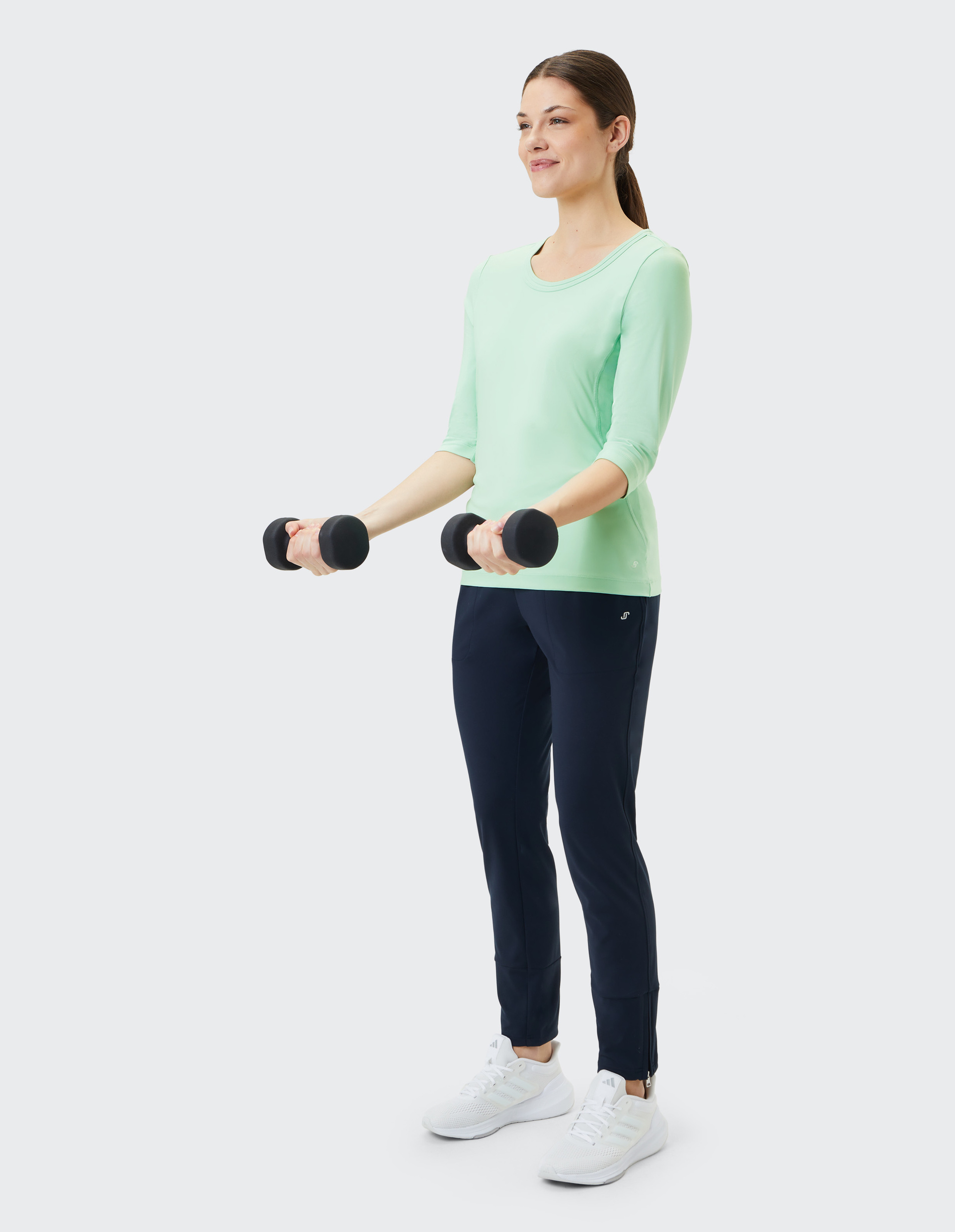 Mintgrünes Damenoberteil mit Dreiviertelärmeln und Rundhalsausschnitt, schlichtes Design und einfarbig, ideal für den Alltag.